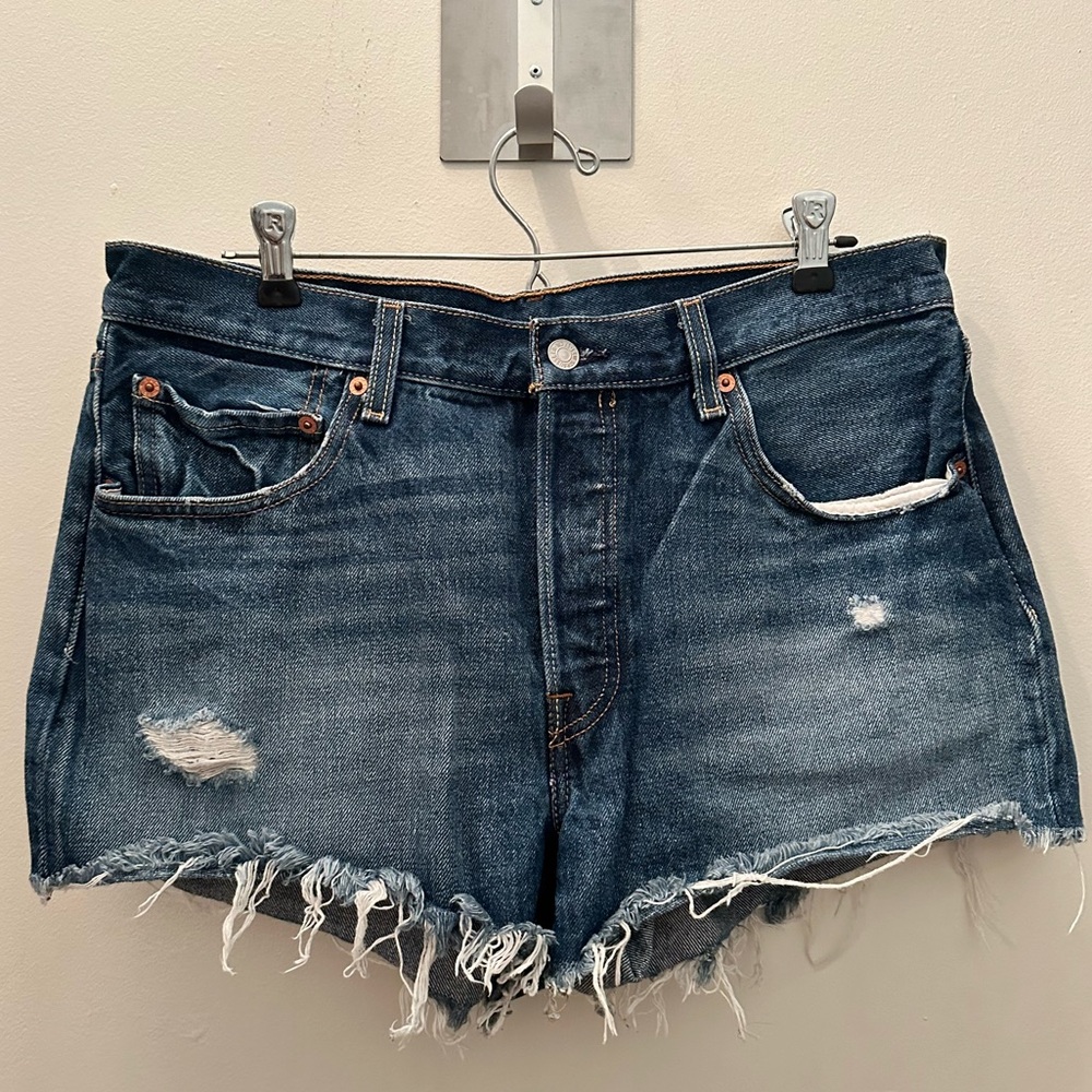 Levi’s 501 cut offs.  100% cotton.